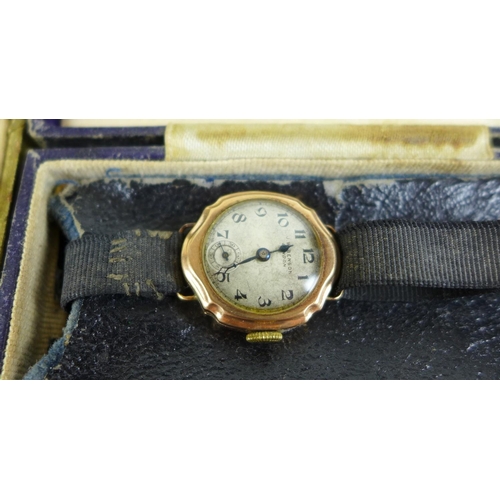 117 - A group of three Edwardian lady's wristwatches, comprising a J. W. Benson 9ct gold cased wristwatch,... 