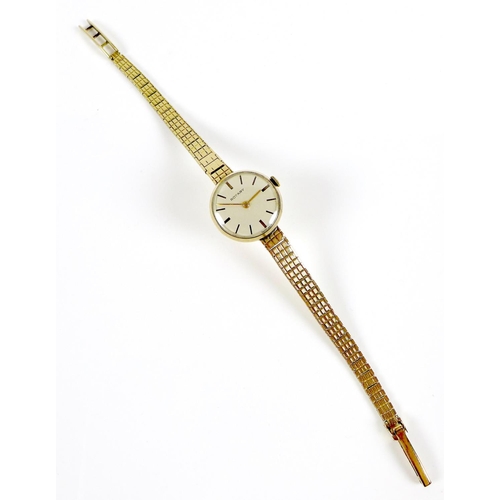 128 - A Rotary 9ct gold cased lady's wristwatch, circa 1960s, circular silvered dial with gold batons, 15 ... 