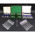 A collection of  Silver and silver plated cased flatware, comprising a George V cased set of six sil... 