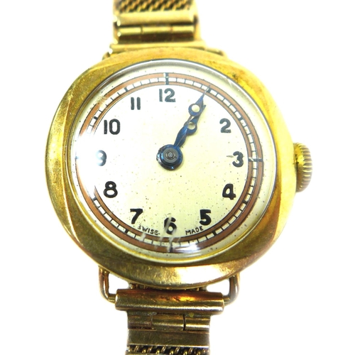 144 - A 9ct gold Ladies wristwatch, with Arabic dial, 9ct gold Vertex case and 9ct gold adjustable bracele... 