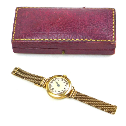 144 - A 9ct gold Ladies wristwatch, with Arabic dial, 9ct gold Vertex case and 9ct gold adjustable bracele... 