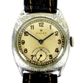 A Rolex cushion cased mid sized wristwatch, circa 1940, circular silvered dial, raised gold Arabic n... 