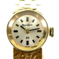 A Bulova, 18ct gold cased, lady's cocktail watch, with textured 18ct gold bracelet strap, 18.5cm lon... 