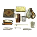 A selection of tobacciana including an amber cheroot holder with 9ct rose gold collar, cased, a seco... 