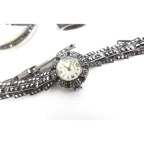 168 - A group of vintage and late Art Deco silver and marcasite jewellery, comprising a cocktail watch, Bi... 