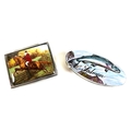 Two contemporary silver pill boxes with decorative lids, comprising an oval box with hand painted en... 