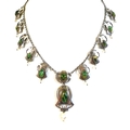 An Art Nouveau Murrle Bennett & Co silver necklace, with a central large drop pendant set with mottl... 