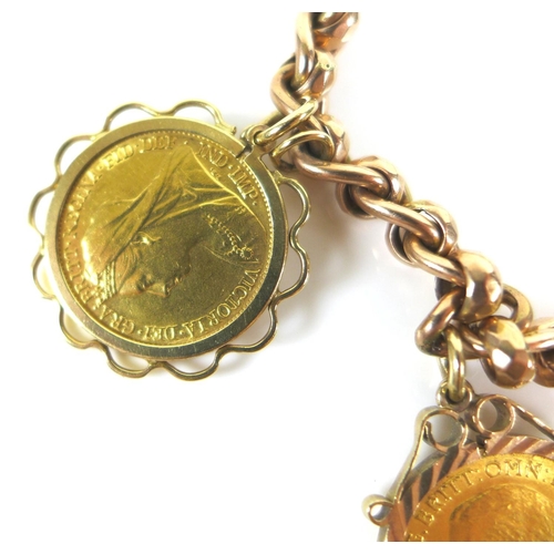 320 - A 9ct gold chain bracelet, fitted with two 9ct gold mounted half sovereign pendants, one a Victorian... 