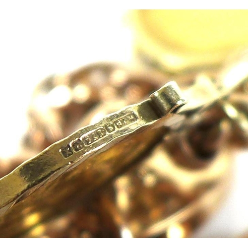 320 - A 9ct gold chain bracelet, fitted with two 9ct gold mounted half sovereign pendants, one a Victorian... 