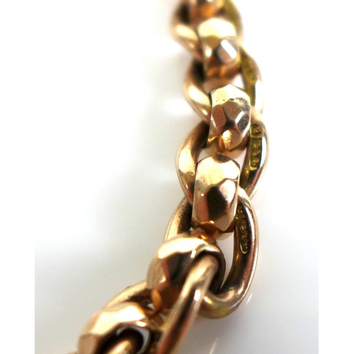 320 - A 9ct gold chain bracelet, fitted with two 9ct gold mounted half sovereign pendants, one a Victorian... 