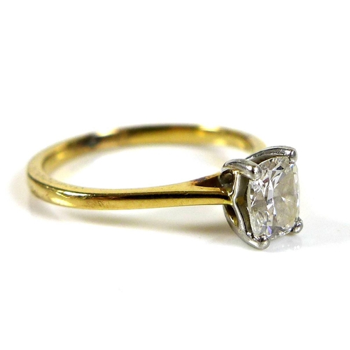 322 - A diamond solitaire 18ct gold and platinum ring, the cushion cut diamond of approximately 0.52ct, si... 