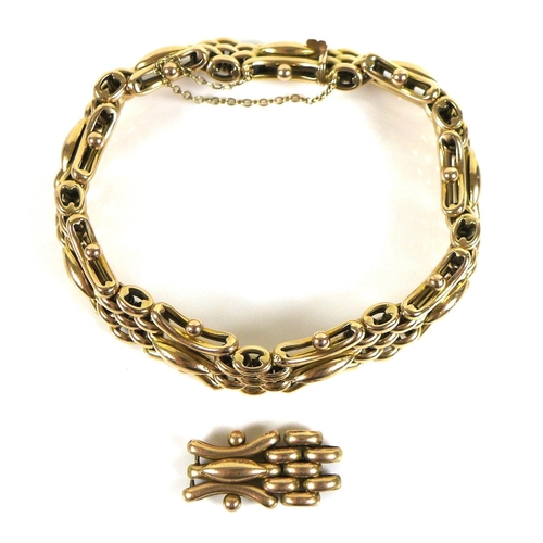 324 - A 15ct gold fancy link bracelet, with safety chain, together with a spare link, 27.1g total.