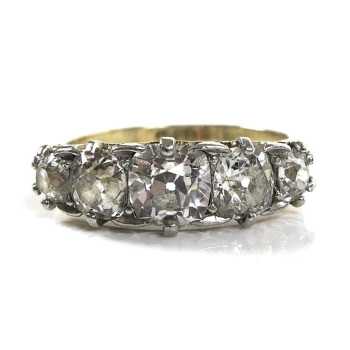 326 - An 18ct gold and diamond five stone ring, the central stone approximately 0.5ct, 4.9 by 4.9mm, small... 