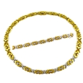 An 18ct gold and diamond designer necklace and bracelet, formed of white gold X's, each studded with... 