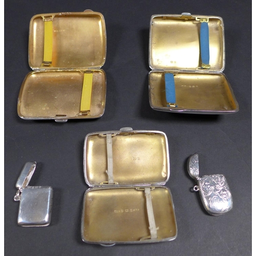 41 - A collection of three silver cigarette cases and two silver vesta cases, one a scrolling foliate eng... 