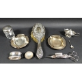 A group of silver items, comprising a pair of circular ashtrays, with beaded rims, Adie Brothers Ltd... 