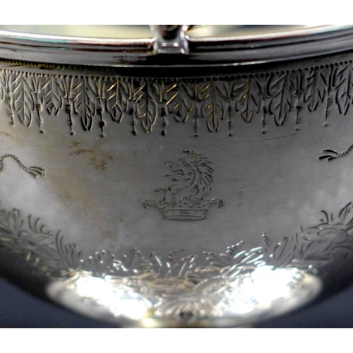 66 - An early Victorian silver sweetmeat dish, of boat form, bright cut engraved decoration, armorial eng... 