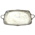 A large Edward VII silver twin handled serving tray, with gadrooned and shell clasped rim, the centr... 