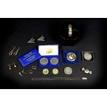 A small collection of silver jewellery and coins, including a sweet wrapper style locket, a necklace... 