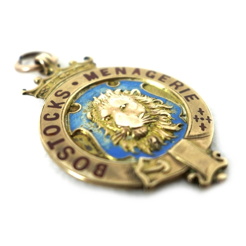 89 - An Edward VII 9ct gold medallion, of circular form with a central relief cast and pale blue enamelle... 