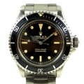 A Rolex Oyster perpetual submariner wristwatch, flexible stainless steel strap, black face, 200m-660... 