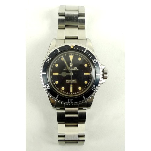 1377 - A Rolex Oyster perpetual submariner wristwatch, flexible stainless steel strap, black face, 200m-660... 