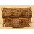 Rattan and cowrie shell basket from Lombok. 20 x 14cm.