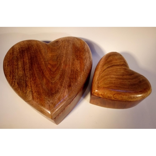 Two heart shaped boxes with lids. Carved in Mango wood from India