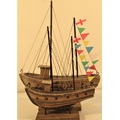 2x wood and painted boats with full rigging and flags 30 x 42 and 22 x 30cm. New