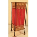 Table lamp. Rattan and red cloth with metal corner posts. 32 x 11cm. New