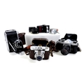 A collection of vintage cameras and accessories, including a Voigtlander Vito B, with case, an Ensig... 