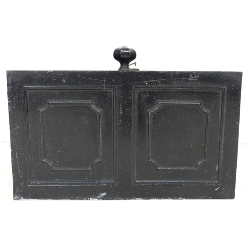 162 - A cast iron strongbox, circa 1900, painted black, with hinged lid and carry handles to side, with tw... 