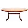 A G-Plan teak oval dining table, circa 1970, extending with integral central leaf, 46cm wide, with t... 