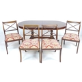 A modern reproduction extending dining table, in Regency style, of D end form with twin pedestals an... 