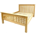 A modern oak veneered double bed frame, with slatted ends, comprising headboard, footboard, two side... 