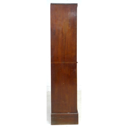 204 - A Victorian mahogany cupboard, with open shelf and door below, 56 by 31 by 138.5cm high.