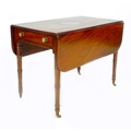 A Regency mahogany side table, drop leaves, with single frieze drawer, raised on turned legs and bra... 
