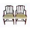 A pair of 19th century open armchairs, with carved rails and splats, padded pale green velvet seats,... 