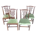 A group of four George III mahogany dining chairs, two pairs, 56 by 55 by 96cm high and 54 by 54 by ... 