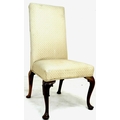 An early Georgian walnut chair, with high squared back, upholstered in cream floral embroidered fabr... 