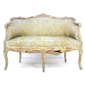 A French 19th century giltwood two seater settee, Louis XV style canape, with floral carved frame, p... 