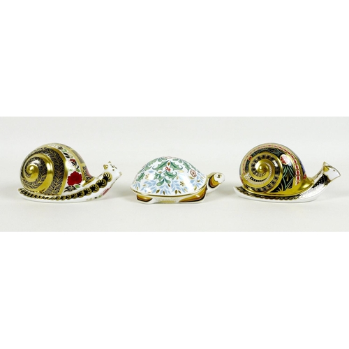 27 - A group of three Royal Crown Derby paperweights, comprising 'Garden Snail', limited edition 151/4500... 