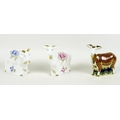 A group of three Royal Crown Derby paperweights, all modelled as goats, comprising 'Nanny Goat', Exc... 