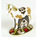 A Royal Crown Derby paperweight, modelled as 'Epsom Filly, limited edition 229/500, MMXIII, gold sto... 