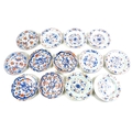 A group of thirteen 19th century Chinese Export porcelain circular dishes, all decorated in similar ... 