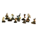 A group of eight Country Artists bird figurines, comprising Barn Owl, 22cm high, Kingfisher, 21cm hi... 
