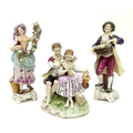 A pair of Rudolstadt Volkstedt figurines, in the Dresden style, comprising male and female flower se... 