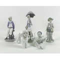 A group of five Lladro porcelain figures, including Fisherboy, number 4809, 21.5cm high, Boy with Ya... 