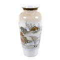 A Japanese Satsuma pottery vase, decorated with a continuous landscape, cherry blossoms, trees and h... 
