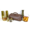 A group of collectables, including a pair of shell case vases, a vintage Gladstone bag, and two retr... 
